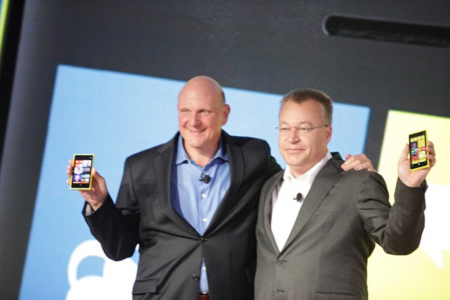 Microsoft CEO Steve Ballmer and Stephen Elop, president and CEO of Nokia, show off their new Lumias running Windows Phone 8. 