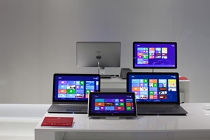 (front left counterclockwise): Vizo 14" Thin + Light Touch, 11.6 Tablet PC, 15.6" Thin + Light Touch, and 24" All-in-one Touch PC