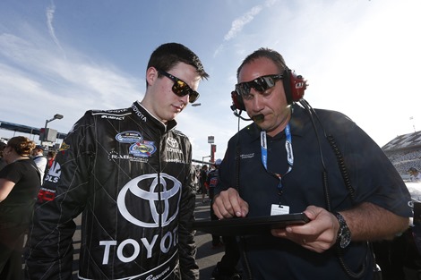 RAB Racing with Brack Maggard driver Alex Bowman and crew chief Chris Rice check early results of the Nationwide field on his Surface Pro before his qualifying run.