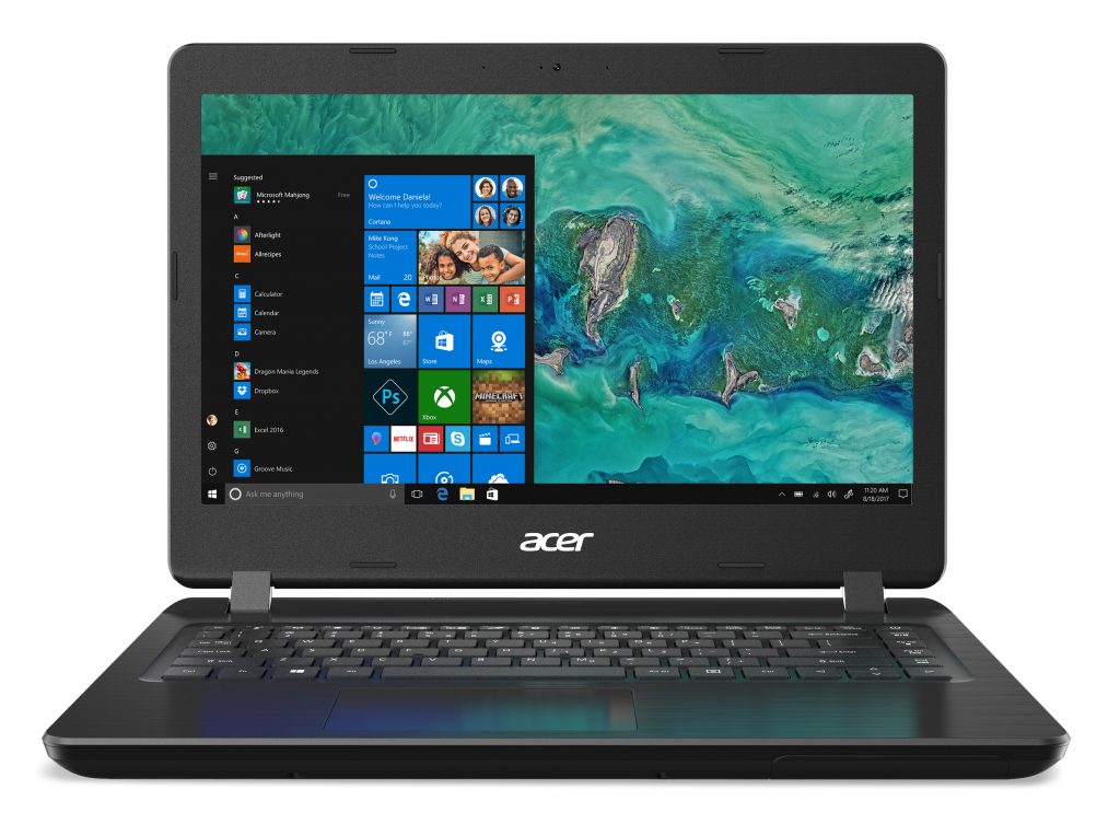 Acer Aspire 3 facing viewer with the Windows Start menu and ocean background on screen