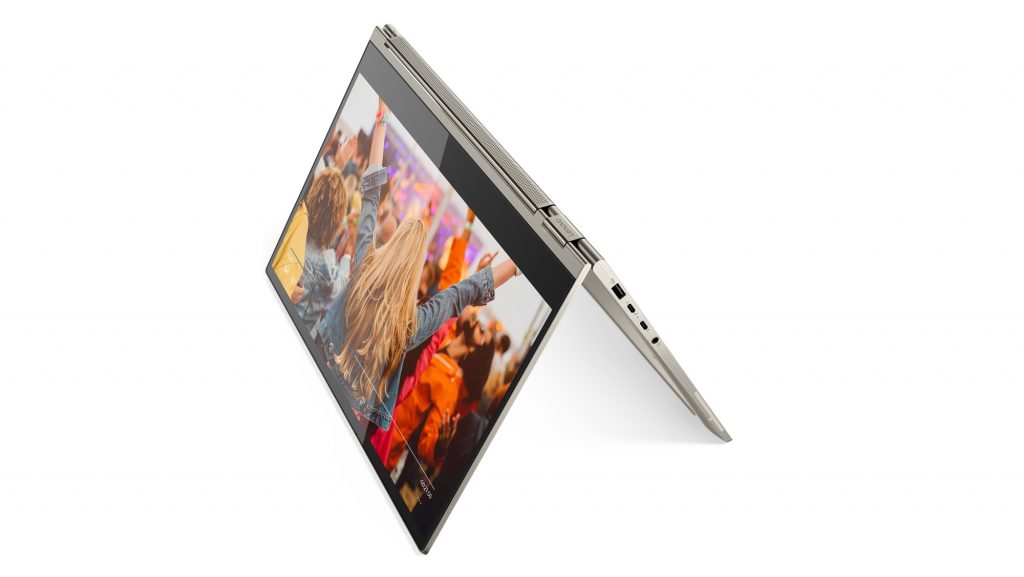Lenovo Yoga C930 inverted, showing a crowd on the screen