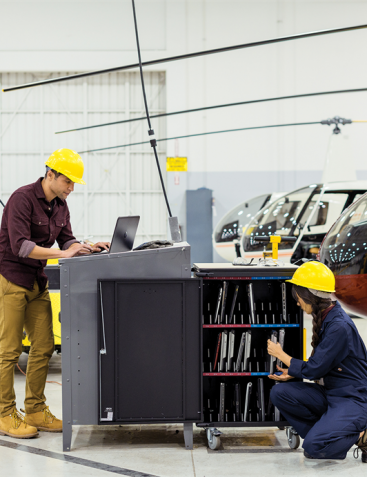 Two people working in a warehouse