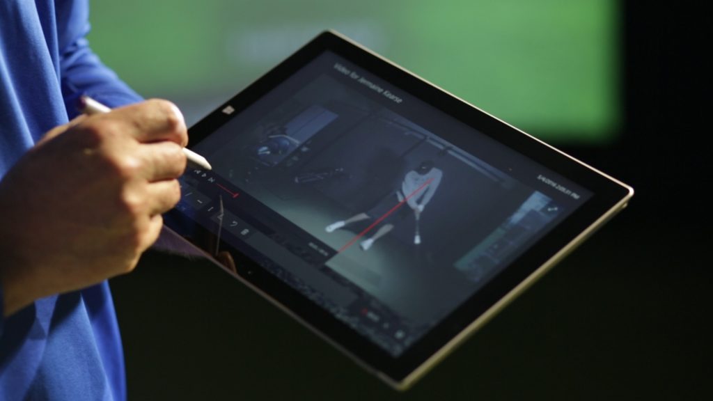 At the Gregg Rogers Golf Performance Centers, an instructor uses “The Gregg Rogers Golf Performance” Windows 10 UWP training app on his Surface Pro device to record and provide immediate feedback on a student’s body mechanics, club-head speed and swing angle. 