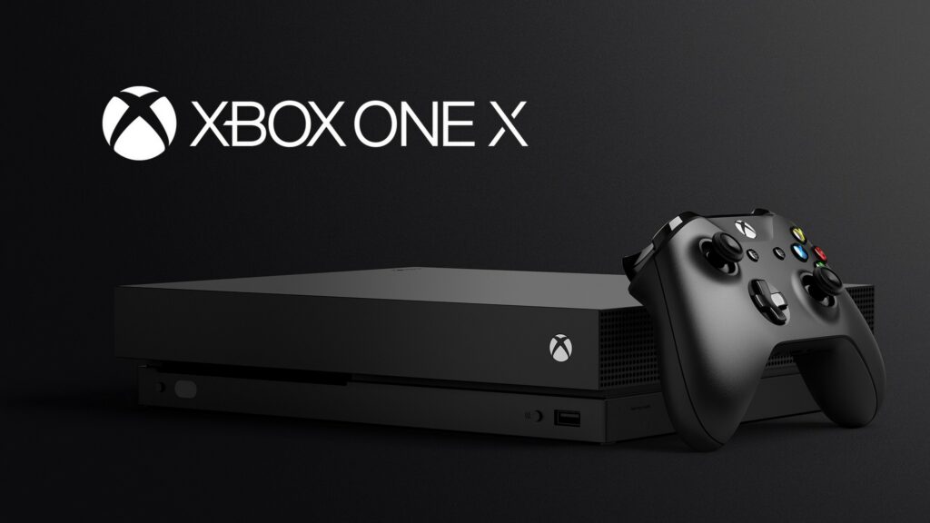 Xbox One X with Controller Tilted Gray Background