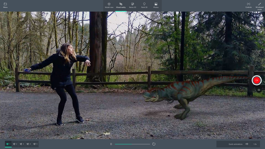 Woman standing outside next to a 3D model of a dinosaur in Mixed Reality Viewer
