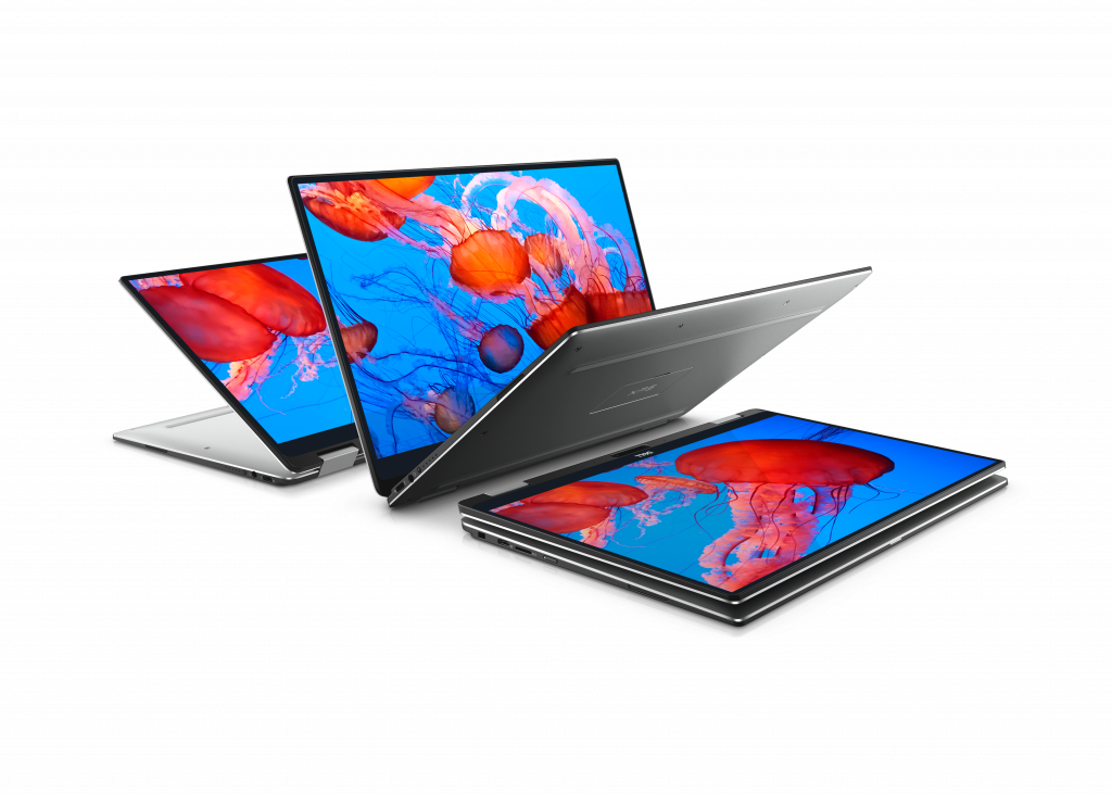 Three Dell XPS 13 2-in-1s, opened inverted, open and flat, with screens showing jellyfish
