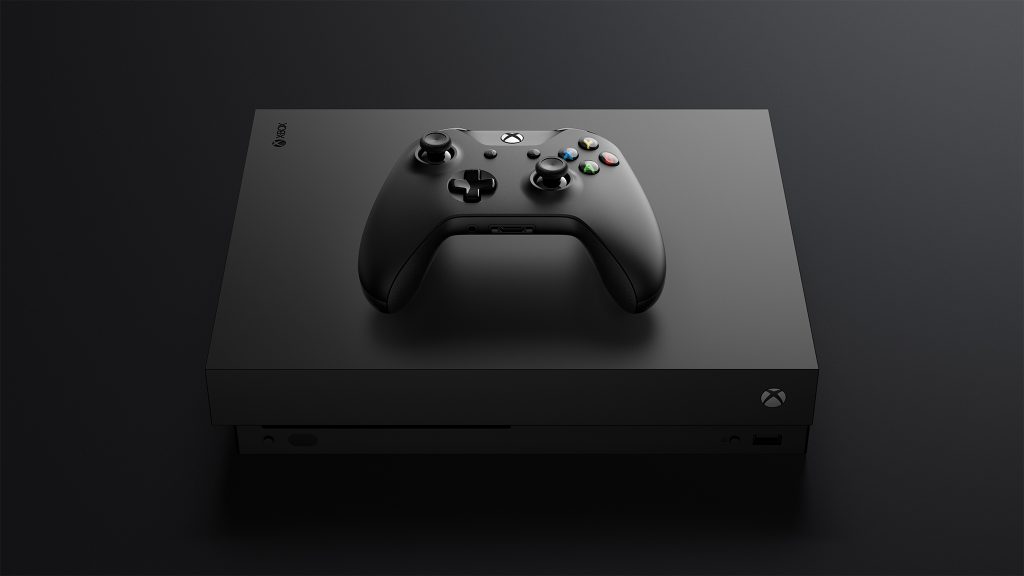Photo of an Xbox One X console and controller