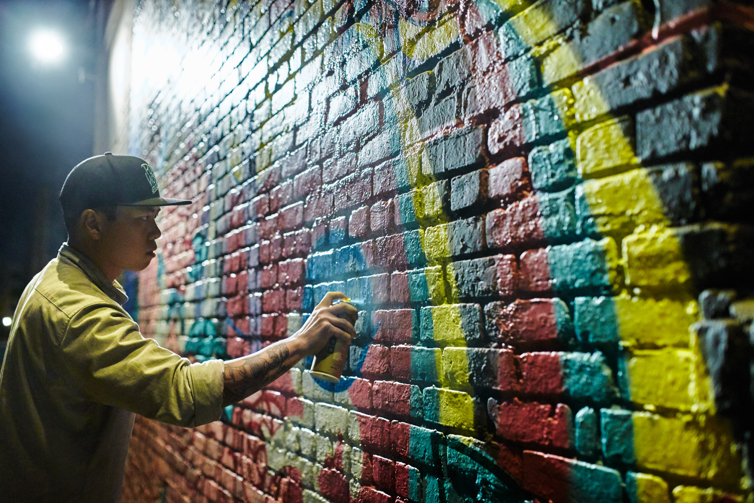 Jasper Wong creating his mural.