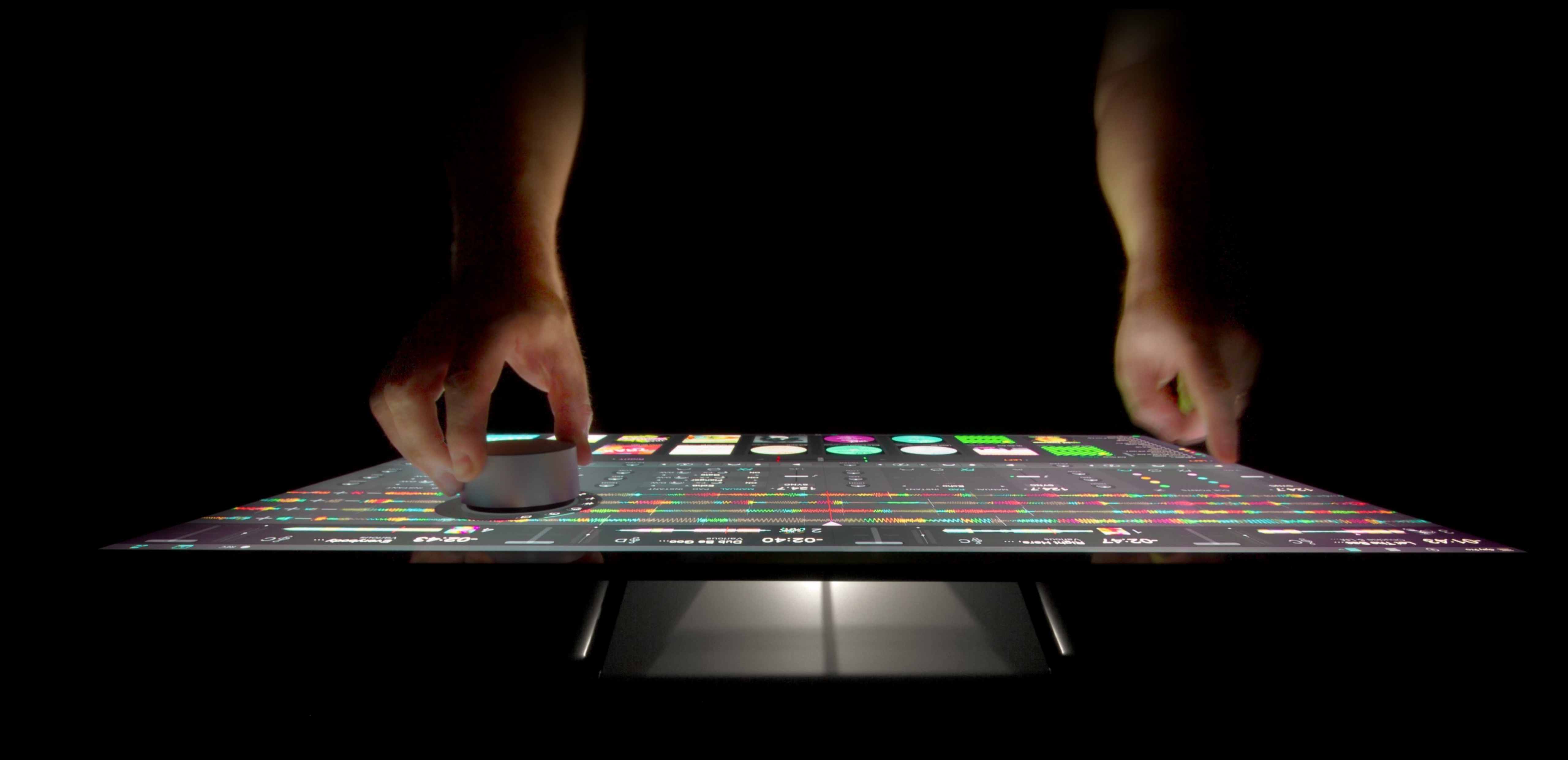 Algoriddim's award-winning DJ application running on Surface Studio with Surface Dial.