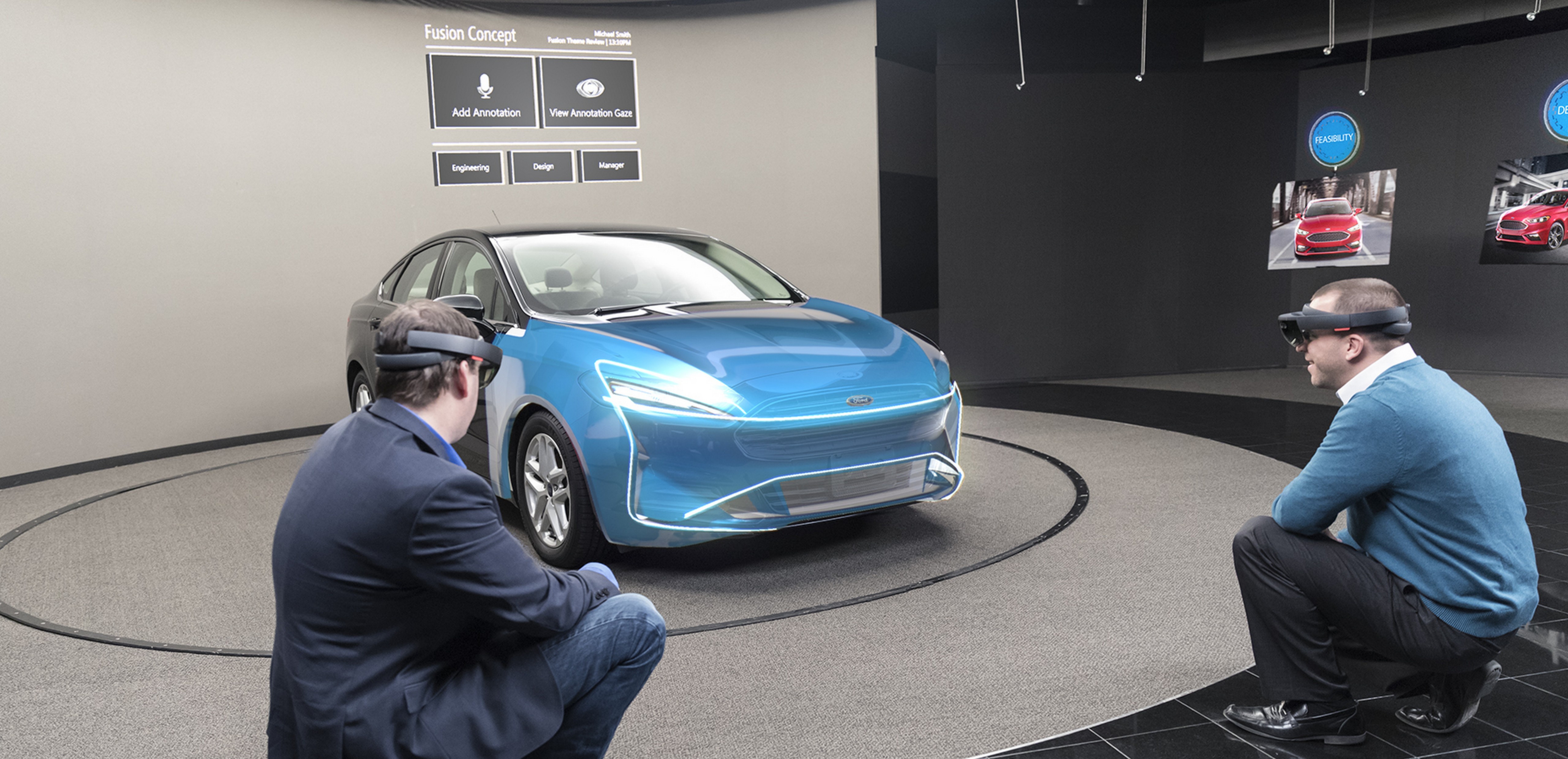 Two men wearing Microsoft HoloLens looking at a hologram of a Ford vehicle.