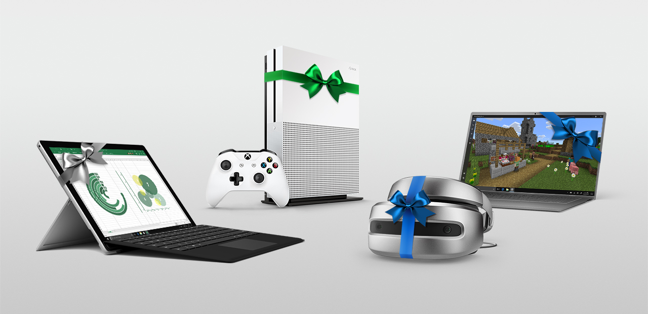 Surface Pro, Xbox One S, a Windows Mixed Reality Headset and a Windows 10 PC pictured together