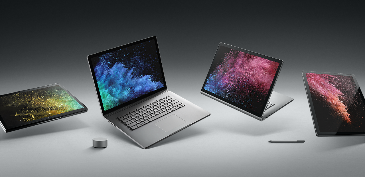 Surface Book 2 shown on a grey background in four different modes.