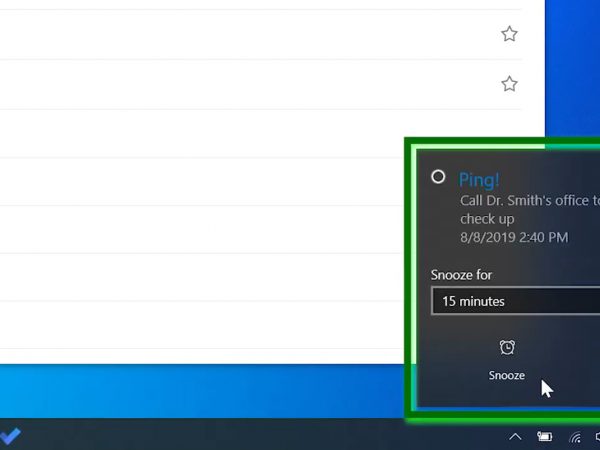 Screenshot focused on a pop-up reminder from Cortana