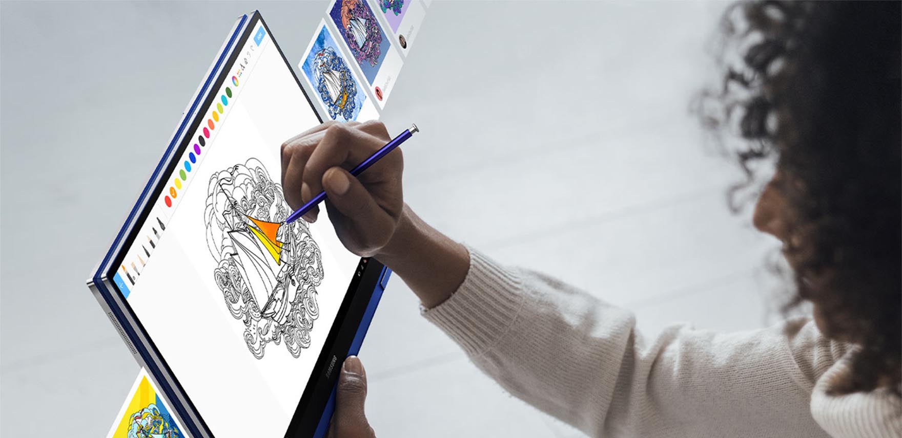 Woman using S-pen to draw on Samsung Galaxy Book Flex