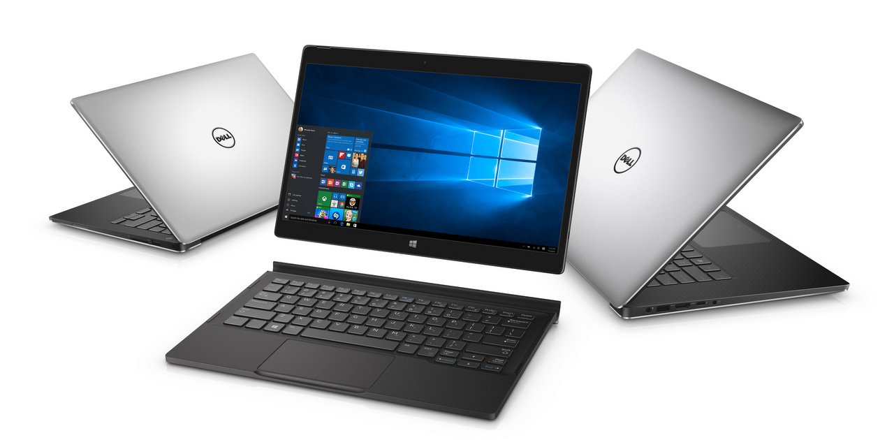Three Dell XPS notebook computers arranged in a semi-circle. An XPS 13 is on the far left, open 45 degrees facing back left. An XPS 12 2-in-1, is in the middle, with the tablet screen hovering above a keyboard attachment and the XPS 15 is on the right, open 45 degrees facing back right.