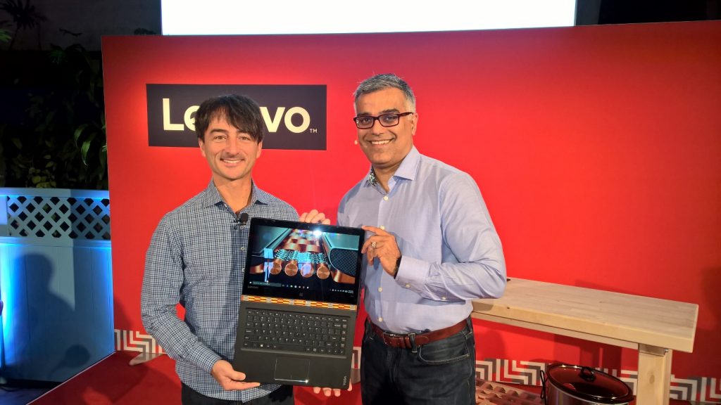 Joe Belfiore pictured with Dilip Bhatia, Lenovo, holding the brand new Lenovo YOGA 900 Windows 10 convertible laptop
