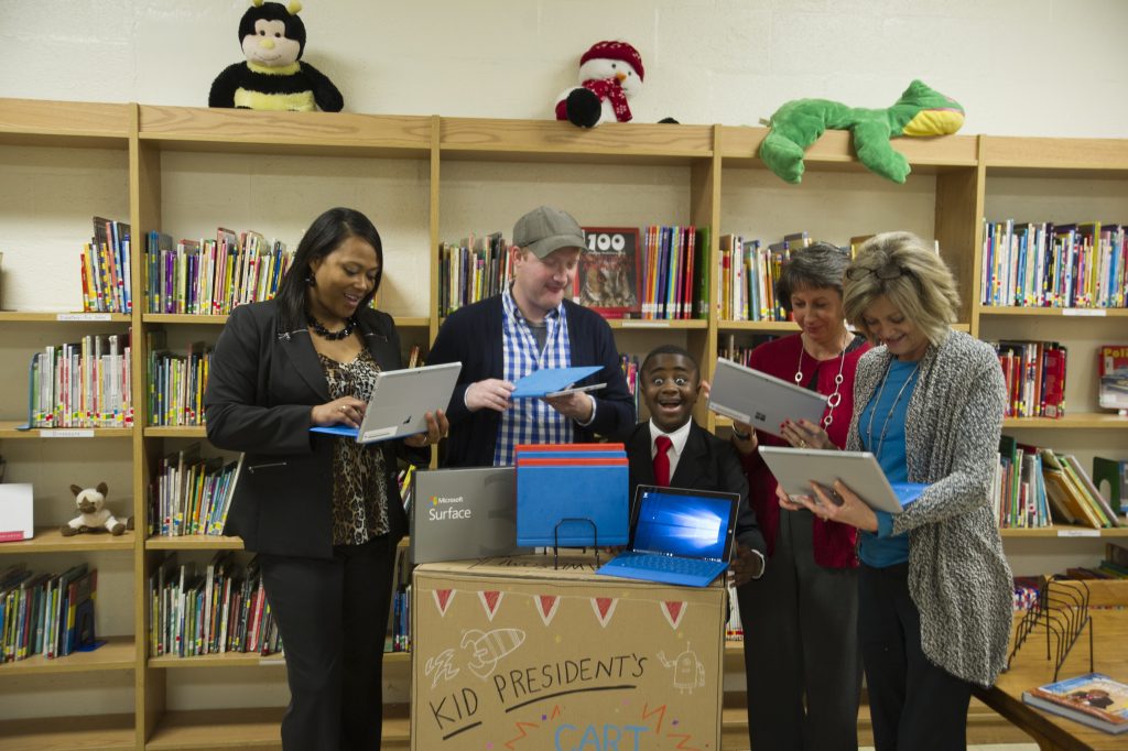Robby Novak, Kid President, and Brad Montague, Kid President creator, team up with Microsoft to ‘Upgrade the World’ for students with Surface 3s on Windows 10 at the Jackson, Tennessee, Lincoln Magnet School for Mathematics & Science on December 16, 2015.