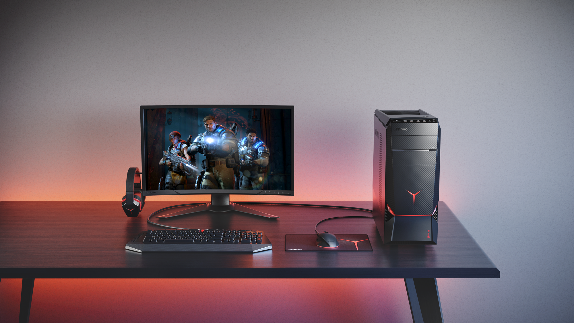 Lenovo Legion Y720 Tower on a desk with a monitor, keyboard and mouse.