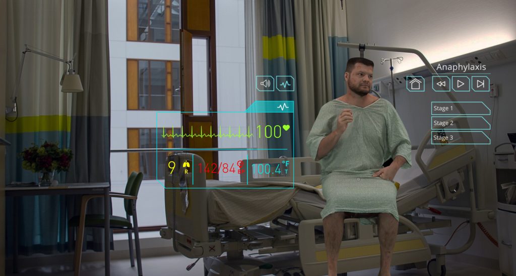Hologram of a patient sitting on a hospital bed called HoloPatient created by Pearson.