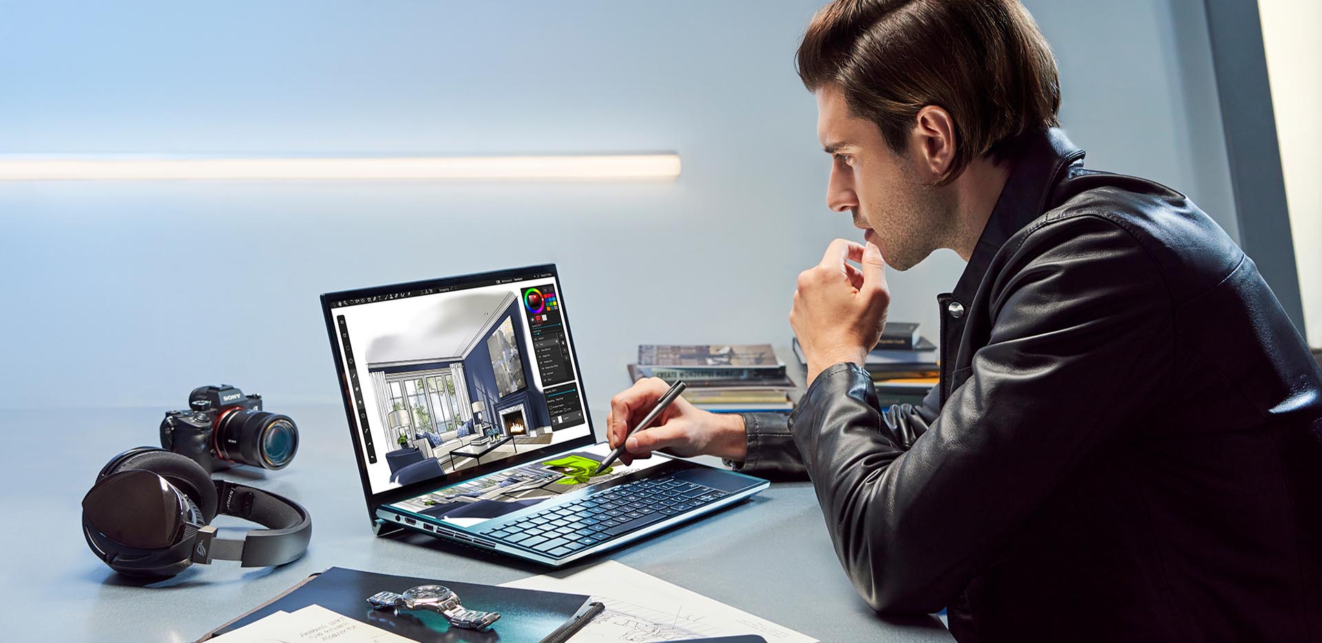 Man works using a ZenBook Pro Duo laptop