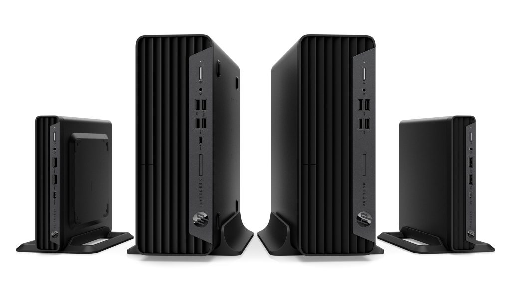 Four HP desktop towers side by side facing reader