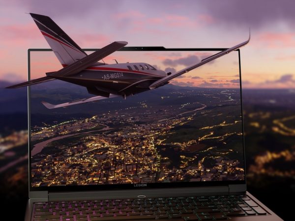 Microsoft Flight Simulator small plane flying in 3D over Lenovo Legion laptop