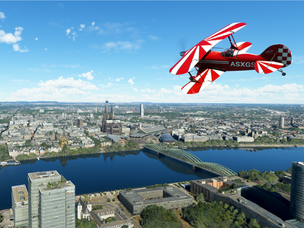 Biplane soars over Cologne, Germany
