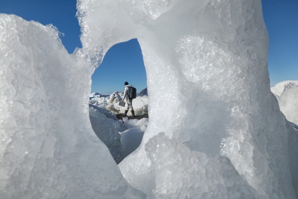 Hiker captured through hole in ice formation