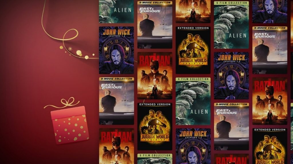 Movie titles lined up in several rows next to a wrapped present