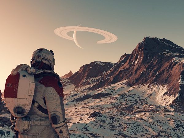 Explorer in space suit looking out over alien landscape