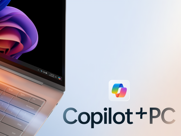 Laptop computer along with Copilot logo and text reading Copilot Plus+ PC