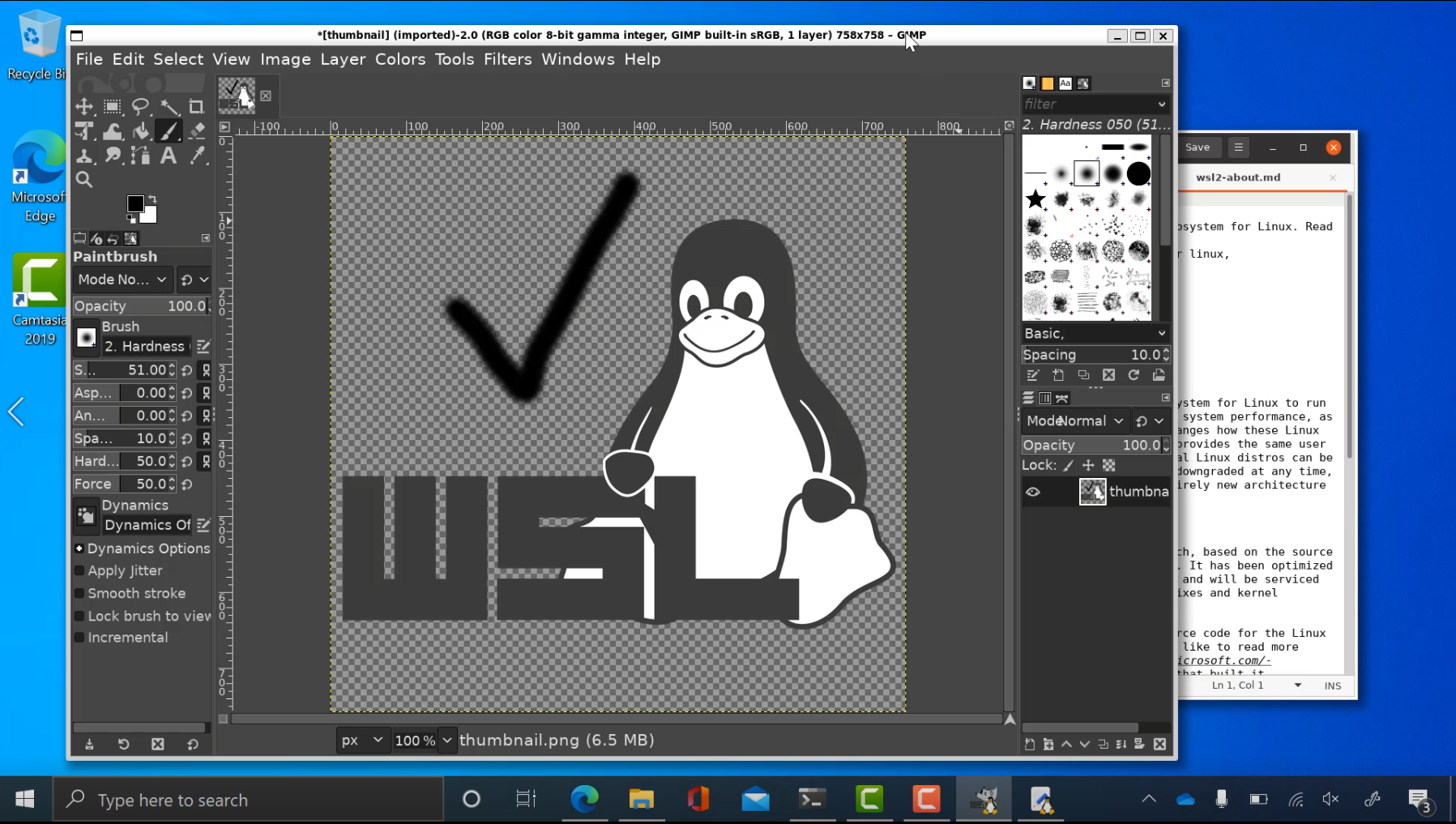 The Linux GUI apps GIMP and gedit running side by side on the Windows Subsystem for Linux