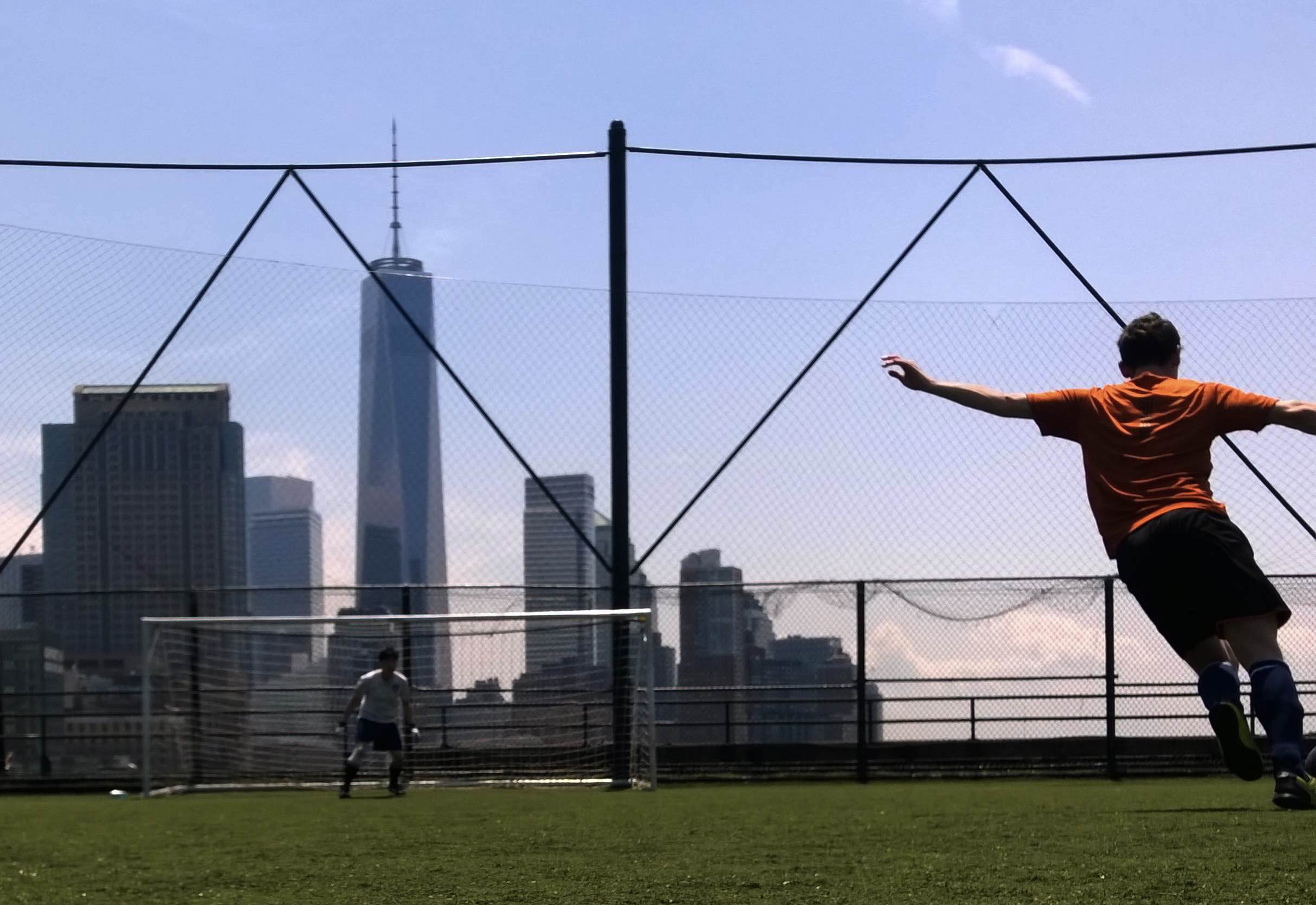 Warming up on the Pier 40 rooftop field in the footsteps of the Freedom Tower. New York, NY USA