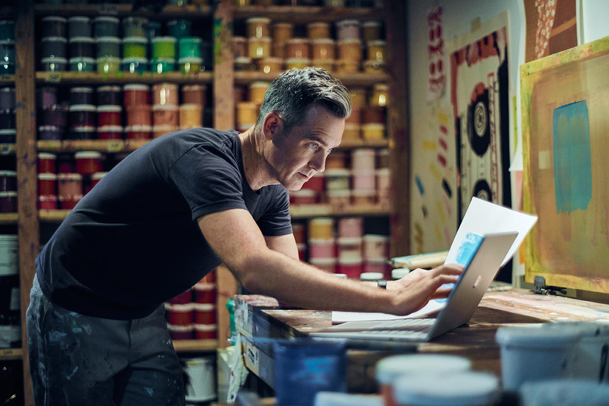 Comic book artist Jordan Crane working with his Surface Book.