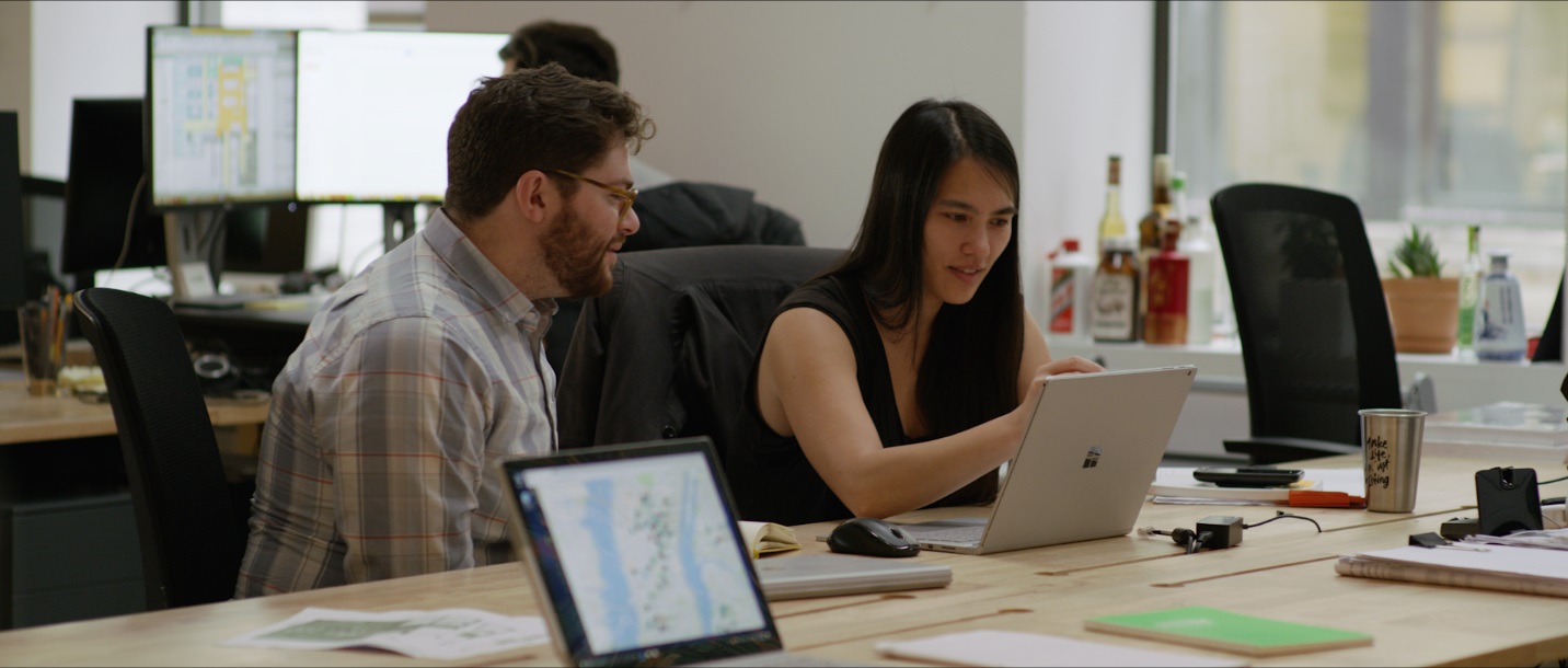 WeWork design team members leveraging touch and ink capabilities of Microsoft Surface Book while working on applications such as Adobe Illustrator, Adobe InDesign and Autodesk AutoCAD.