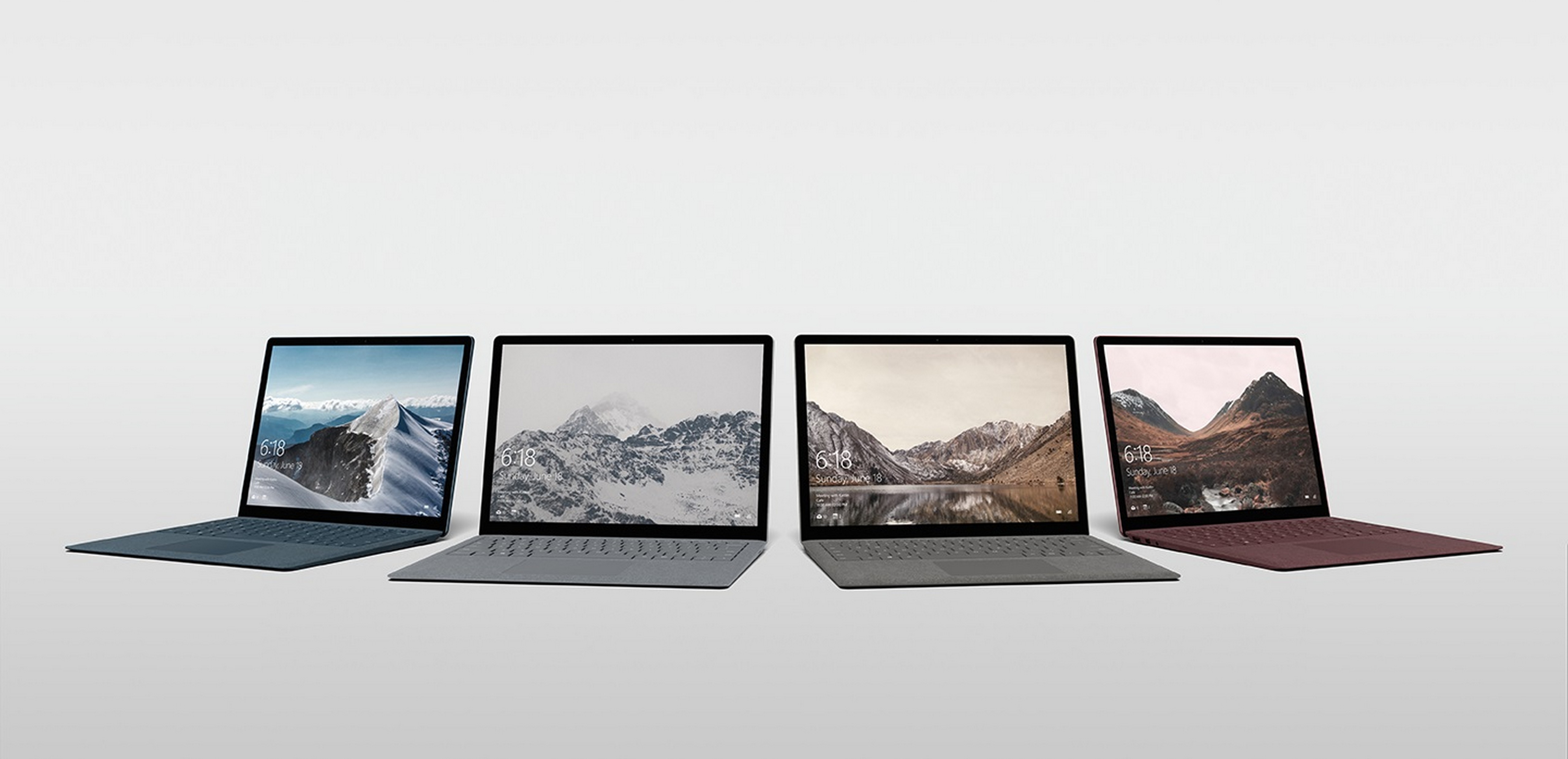 Microsoft Surface Laptop shown above closed in all four colors, Platinum, Graphite Gold, Cobalt Blue and Burgundy