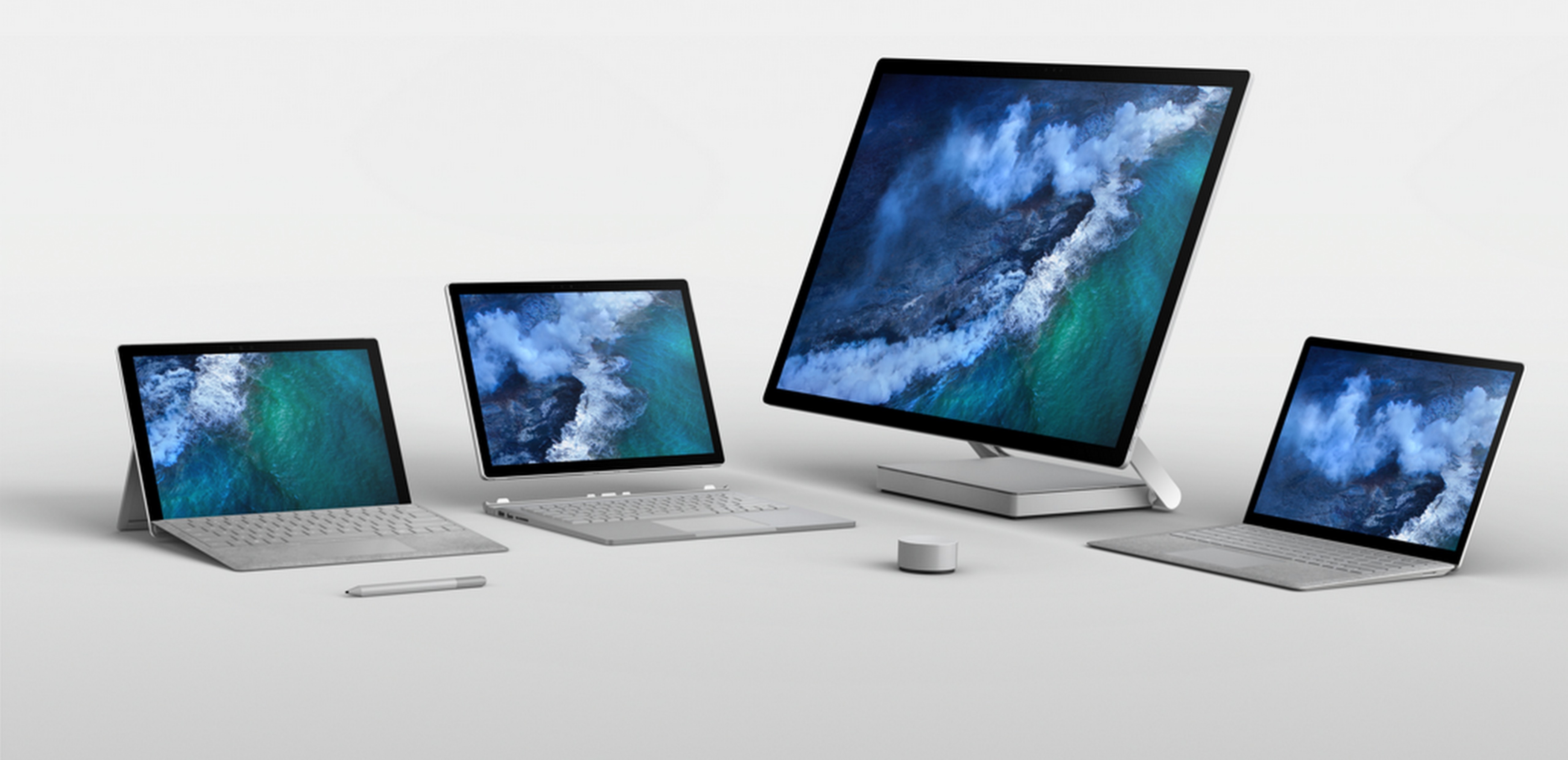 Surface family device shot, from left to right shown, the new Surface Pro, Surface Book, Surface Studio, and Surface Laptop in Platinum color.