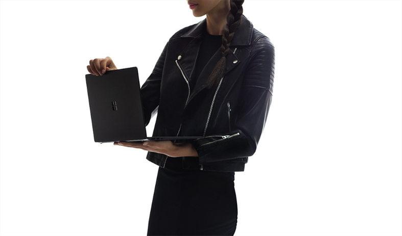 Woman holding Surface device