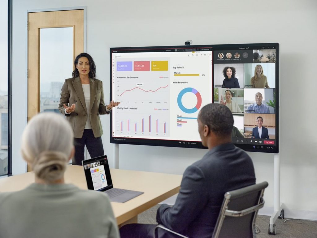 Woman leading a presentation in a conference room