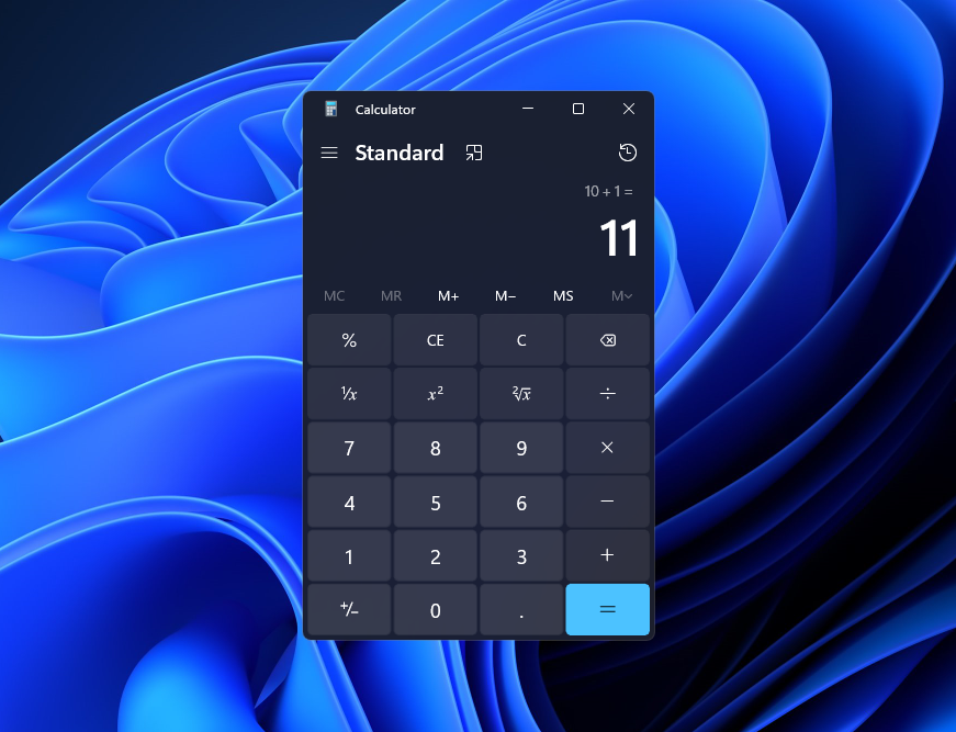 Calculator app in dark mode with new Windows 11 visuals.