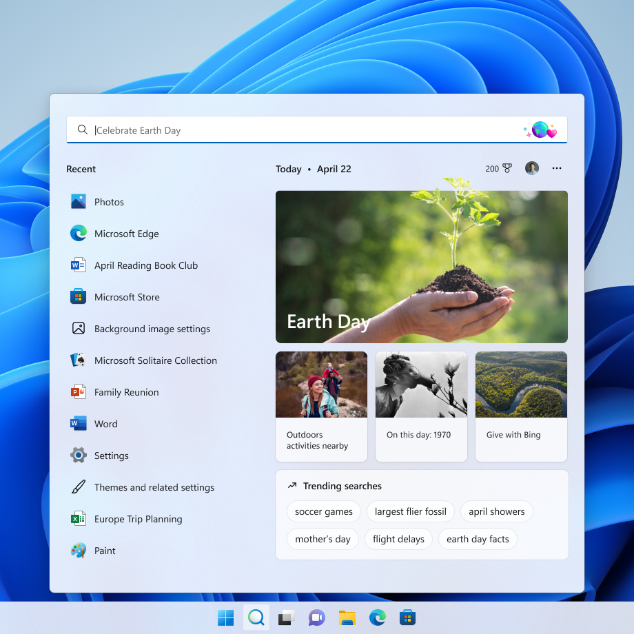 Search on the taskbar showing an updated experience for Earth Day. Includes relevant content and illustration in the search box and content relevant to Earth Day in search home.